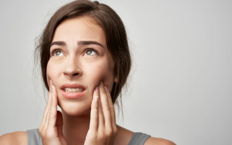 How Can a Full Mouth Reconstruction Help With TMJ Dysfunction
